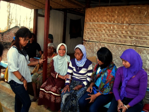 Big, little, and medium-age Madura girls chatting in the village